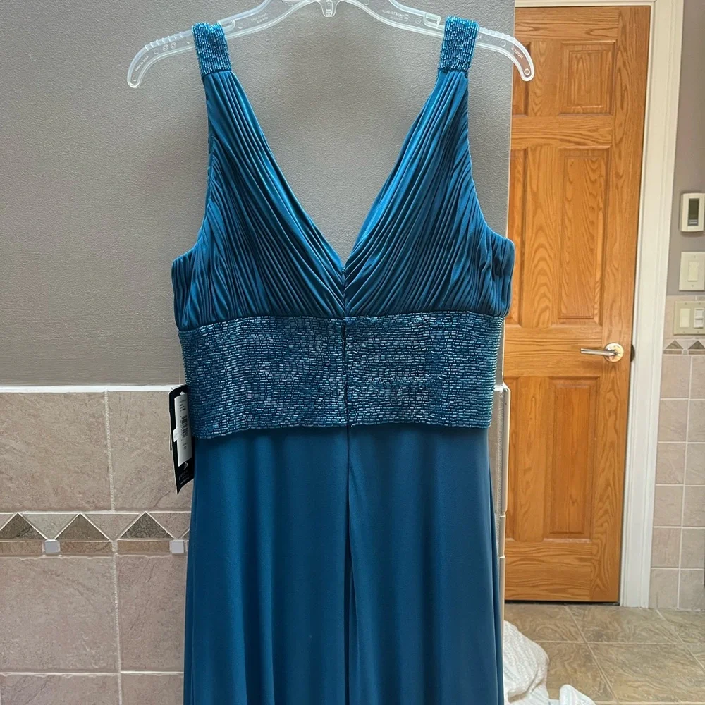 NWT deep turquoise blue formal beaded dress. Back zipper closure with hook. - Picture 4 of 7